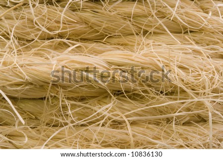 A background consisting solely of frayed sisal rope.