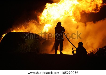 KILKIS,GREECE - MAY,9: Fire-fighters trains extinguishing a fire on May 9, 2007 in Aspros Kilkis, Greece.