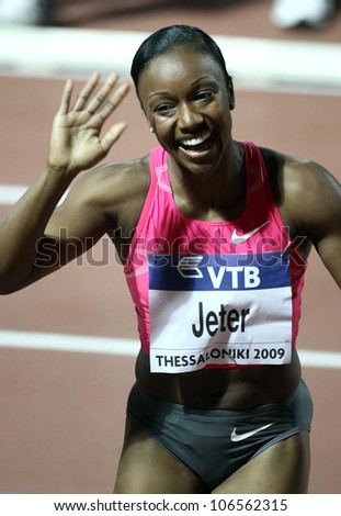 THESSALONIKI, GREECE - SEPT 12:Carmelita Jeter celebrates winning the women's 100m final at the IAAF 2009 World Athletics Final on September 12, 2009 in Kaftatzoglio stadium,Thessaloniki,Greece