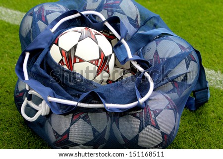 GELSENKIRCHEN, GERMANY -AUG 21: Adidas Champions League football balls in the field before the match Schalke vs PAOK on Aug 21,2013 in Gelsenkirchen, Germany.