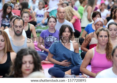 THESSALONIKI, GREECE - SEPT 22 : People perform yoga training during the Day without Car outdoor activities on September 22, 2013 Thessaloniki, Greece.