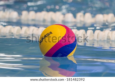 THESSALONIKI, GREECE MAR 5, 2014 : A water polo ball floating on the water in a pool during the water polo game PAOK vs Nereas on March 5, 2014.