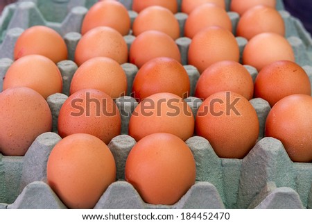 Background of fresh eggs for sale at a market