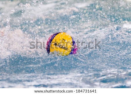 THESSALONIKI, GREECE MAR 22, 2014 : A water polo ball floating on the water in a pool during the Greek League water polo game PAOK vs Vouliagmeni on March 22, 2014.