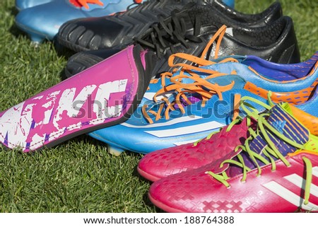 THESSALONIKI, GREECE APRIL 16, 2014 : Football shoes in line during the training before the Greek Cup Semi Final match PAOK vs Olympiacos