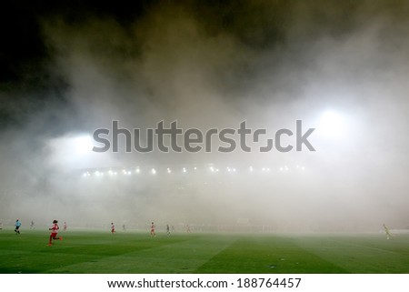 THESSALONIKI, GREECE APRIL 16, 2014 : Smoke all over the stadium during the Greek Cup Semi Final match PAOK vs Olympiacos