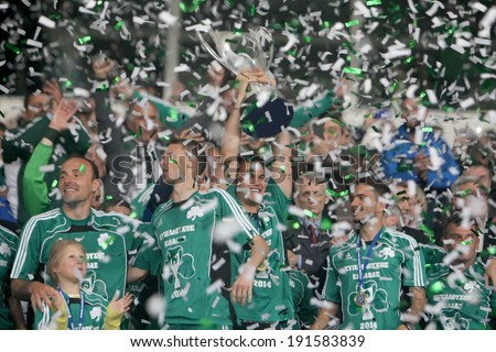 ATHENS, GREECE APRIL 26, 2014 : Players of Panathinaikos lift the Cup after their win over Paok during the Greek Cup Final match Paok vs Panathinaikos