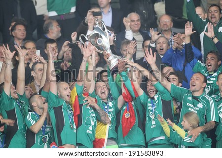 ATHENS, GREECE APRIL 26, 2014 : Players of Panathinaikos lift the Cup after their win over Paok during the Greek Cup Final match Paok vs Panathinaikos