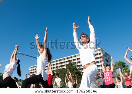 THESSALONIKI, GREECE - JUNE 1 , 2014 : Thessaloniki open yoga day. People gathered to perform yoga training during the day, outdoor activities