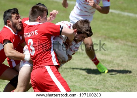 THESSALONIKI, GREECE- MAY 31, 2014: Rugby players striving to get to the ball during the match of Turkey vs Switzerland  for the European Championship Rugby, which took place in Thessaloniki, Greece.