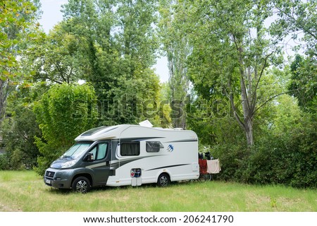 ASPROVALTA, GREECE- JULY 15, 2014: Caravan in organized camping in summertime in Asprovalta, Greece. Many tourists are choosing camping for their summer in Greece.