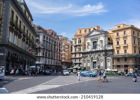 NAPLES, ITALY- AUGUST 3, 2014: Street view of Naples, Italy. Naples historic city centre is the largest in Europe, and is listed by UNESCO as a World Heritage Site.