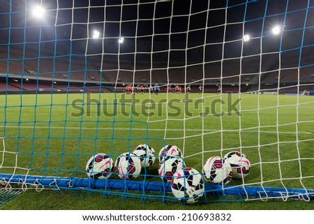 NAPLES, ITALY- AUGUST 2, 2014: Balls in the net before the friendly match Napoli vs Paok.