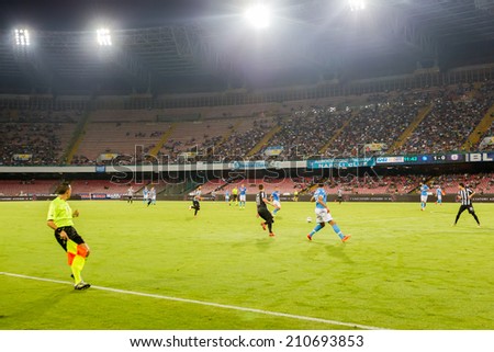 NAPLES, ITALY- AUGUST 2, 2014:  Wide view of the game and the stadium during the friendly match Napoli vs Paok.