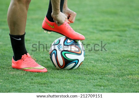 THESSALONIKI, GREECE- AUGUST 14 : Footballer\'s feet in action with a ball before the friendly match Paok vs Inter.