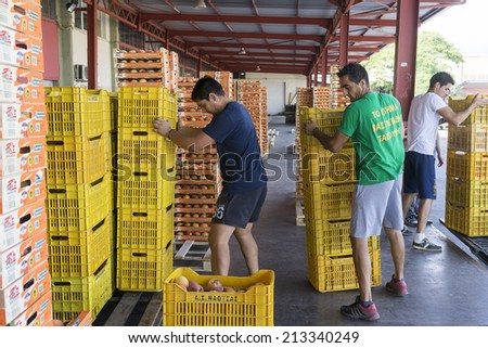 NAOUSSA GREECE- AUGUST 20 2014: Products of Agricultural Cooperative of Naoussa Greece carried in boxes. The famous \