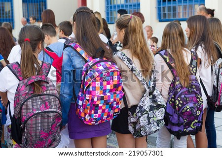 THESSALONIKI, GREECE- SEPTEMBER 11, 2014: Students with their backpacks. First Day of school for the students in Thessaloniki, Greece.