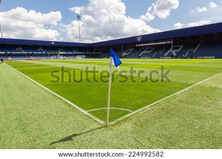 LONDON, ENGLAND - AUG 9, 2014 : Interior view of the empty Loftus Road Stadium before the friendly match QPR vs Paok. Loftus Road Stadium is the home base of the football team QPR.