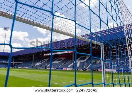 LONDON, ENGLAND - AUG 9, 2014 : Interior view of the empty Loftus Road Stadium before the friendly match QPR vs Paok. Loftus Road Stadium is the home base of the football team QPR.