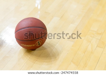 THESSALONIKI, GREECE - JAN 21, 2015: Basketball ball on the ground prior to the Eurocup game Paok vs Khimki in Paok Sports Arena.