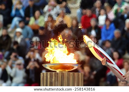 ATHENS,GREECE,OCT 5,2013:The Olympic flame was handed to organizers of the Sochi Winter Olympics 2014. The ceremony took place at the site of the first modern summer games, the Kallimarmaro Stadium