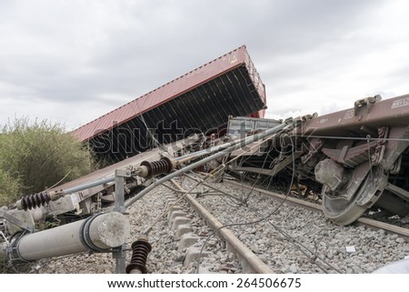 THESSALONIKI, GREECE, MARCH 28,2015: Derailed train coaches at the site of a train accident at the Gefyra community, in northern Greece. The train was carrying electronic equipment .