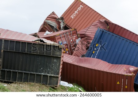 THESSALONIKI, GREECE, MARCH 28,2015: Derailed train coaches at the site of a train accident at the Gefyra community, in northern Greece. The train was carrying electronic equipment .