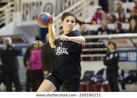 THESSALONIKI, GREECE, MARCH 27, 2015: Handball player jumbs to score during the warm up prior to the Greek Women Cup Final handball game  Paok vs Nea Ionia