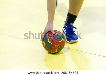 THESSALONIKI, GREECE, MARCH 27, 2015: Undefined hands holding a ball prior to the Greek Women Cup Final handball game  Paok vs Nea Ionia