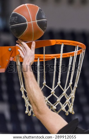 THESSALONIKI, GREECE, JUN 17, 2015: Close-up of a baskeball on the ground during the Greek Basket League game Aris vs Paok