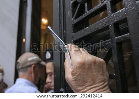 THESSALONIKI, GREECE, JULY, 1 2015: Pensioners queue outside a National Bank branch as banks only opened for the retired to allow them to cash up to 120 euros in Athens