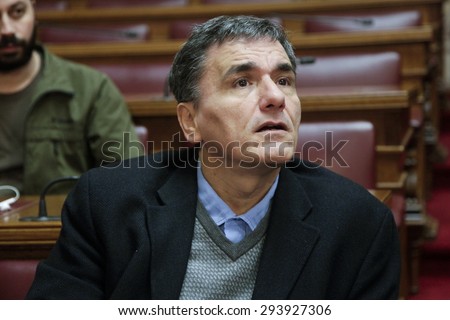ATHENS, GREECE - NOV 25, 2014: The Greek government has announced that the new finance minister, Euclid Tsakalotos. Portraits