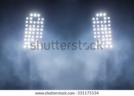 stadium lights and smoke