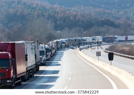 Promachonas, Greece - February 7 2016 :International transport trucks are blocked  from the border crossing of Promachonas between Greece and Bulgaria, as farmers set up a blockade at customs offices.
