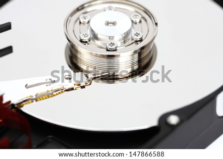 Closeup internal computer hard disk.