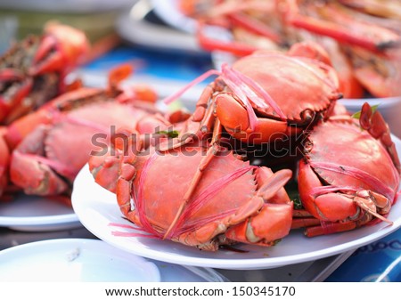 Many red crabs for sale on market