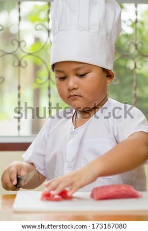 Asian kids are cooking the sushi