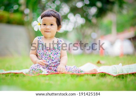 Baby relaxing in the garden