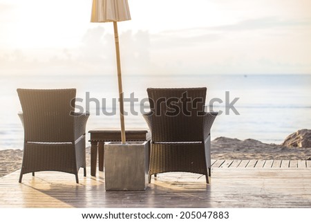 tropical restaurant on the beach with view over turquoise ocean