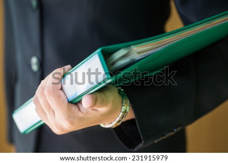 business women holds the document case in the hand