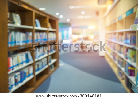 Blurred books in public library. Image Blurred effect. Background.