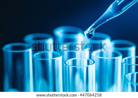 science research concept,Dropping chemical liquid to test tube,