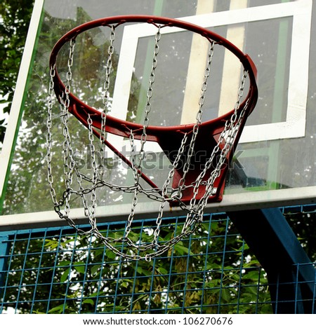 A basketball hoop on the street basketball court