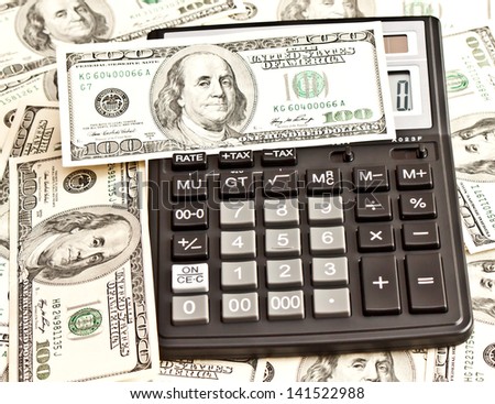 Business picture: money and calculator