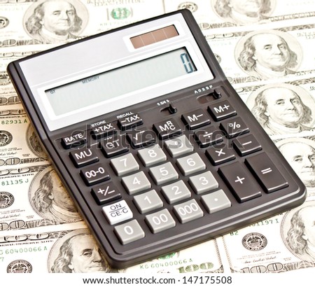 Business picture: money and calculator