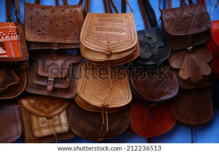 Colorful leather handbags collection on Moroccan market in Chefchaouen