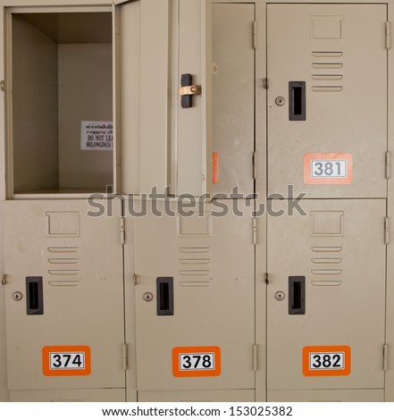 A wall of beige school lockers typical