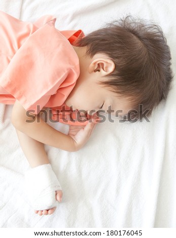 Boy sleeping in hospital patients