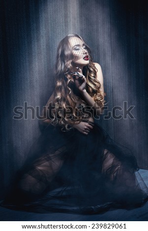 Voluptuous adult woman seduce in lace dress and beauty make up. studio shot