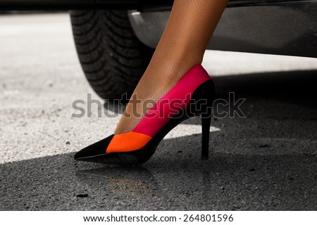 Wonderful female leg in sexy high heels outdoors